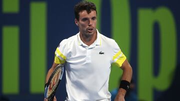 DOHA, QATAR - MARCH 13: Roberto Bautista Agut of Spain reacts during The Qatar ExxonMobil final between Roberto Bautista Agut and Nikoloz Basilashvili on day six of Qatar ExxonMobil Open 2021 at Khalifa International Tennis and Squash Complex on March 13, 2021 in Doha, Qatar. Sporting stadiums around Qatar remain under strict restrictions due to the Coronavirus Pandemic as Government social distancing laws prohibit fans inside venues resulting in games being played behind closed doors. (Photo by Mohamed Farag/Getty Images)