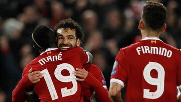 Soccer Football - Champions League Semi Final First Leg - Liverpool vs AS Roma - Anfield, Liverpool, Britain - April 24, 2018   Liverpool&#039;s Sadio Mane celebrates scoring their third goal with Mohamed Salah and Roberto Firmino    REUTERS/Phil Noble