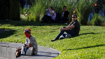 People take a sunbath as the outbreak of the coronavirus disease (COVID-19) continues, in Buenos Aires, Argentina March 31, 2021. REUTERS/Agustin Marcarian