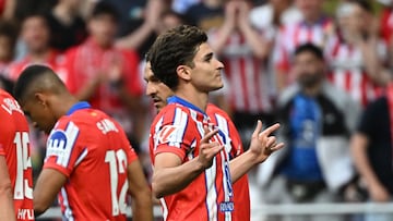 Atletico Madrid's Argentine forward #19 Julian Alvarez celebrates after scoring his team's third goal during the Spanish league football match between Club Atletico de Madrid and Real Betis at Metropolitano Stadium in Madrid on May 18, 2025. (Photo by JAVIER SORIANO / AFP)