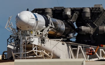 A SpaceX Falcon 9 rocket is prepared, after a delay, for launch of Polaris Dawn.