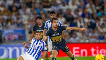 Monterrey's Argentine forward German Berterame (L) vies for the ball with Pumas' midfielder Ulises Rivas during the Mexican Clausura 2024 tournament football match at the BBVA Bancomer stadium in Monterrey, Mexico, on March 3, 2024. (Photo by Julio Cesar AGUILAR / AFP)