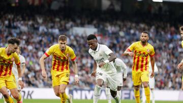 MADRID, SPAIN - OCTOBER 30: Vinicius Junior of Real Madrid, Santi Bueno of Girona FC, during the La Liga Santander match between Real Madrid v Girona at the Santiago Bernabeu on October 30, 2022 in Madrid Spain (Photo by David S. Bustamante/Soccrates/Getty Images)