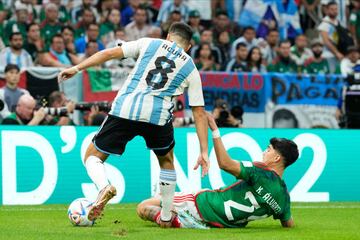 Kevin Alvarez right-back of Mexico and CF Pachuca and Marcos Acuña left-back of Argentina and Sevilla FC compete for the ball during the FIFA World Cup Qatar 2022 Group C match between Argentina and Mexico at Lusail Stadium on November 26, 2022 in Lusail City, Qatar. (Photo by Jose Breton/Pics Action/NurPhoto via Getty Images)