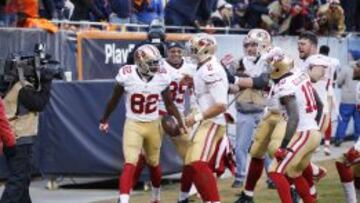 Torrey Smith y Blaine Gabbert celebran el touchdown de 71 yardas en la prórroga que decidió el partido.