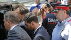 FILE - In this  Thursday, June 2, 2016 file photo, Barcelona soccer player Lionel Messi, center, leaves a court in Barcelona, Spain. A Barcelona court Wednesday, July 6, 2016 has given Lionel Messi and his father suspended sentences of 21 months in prison for tax fraud. In Spain, sentences of less than two years for first offences are suspended, meaning neither man will go to jail. (AP Photo/Manu Fernandez, File)