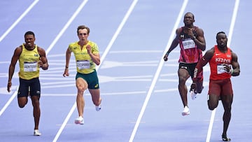 (From L) Colombia's Jhonny Alexander Renteria Jimenez, Australia's Joshua Azzopardi, Panama's Arturo Harmodio Deliser Espinosa and Kenya's Ferdinand Omanyala compete in the men's 100m heat of the athletics event at the Paris 2024 Olympic Games at Stade de France in Saint-Denis, north of Paris, on August 3, 2024. (Photo by Anne-Christine POUJOULAT / AFP)