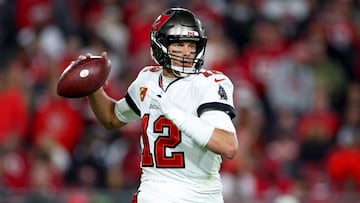 (FILES) In this file photo taken on January 16, 2023, NFL star Tom Brady of the Tampa Bay Buccaneers throws a pass against the Dallas Cowboys during the second half in the NFC Wild Card playoff game at Raymond James Stadium in Tampa, Florida. - Brady announced his retirement on February 1, 2023, at the age of 45 after a storied career that included a record-breaking seventh Super Bowl victory in 2021 and a temporary retirement last year. "I'll get to the point right away: I'm retiring, for good," Brady said in a social media video. (Photo by Mike Ehrmann / GETTY IMAGES NORTH AMERICA / AFP)