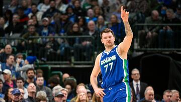 Jan 24, 2023; Dallas, Texas, USA; Dallas Mavericks guard Luka Doncic (77) motions to his teammates during the first quarter against the Washington Wizards at the American Airlines Center. Mandatory Credit: Jerome Miron-USA TODAY Sports