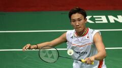 Japan&#039;s Kento Momota plays a shot against Denmark&#039;s Hans Kristian Vittinghus during the Yonex-Sunrise India Open 2016 badminton. He has been banned indefintely.