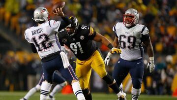 PITTSBURGH, PA - DECEMBER 17: Tom Brady #12 of the New England Patriots attempts a pass under pressure from Stephon Tuitt #91 of the Pittsburgh Steelers in the fourth quarter during the game at Heinz Field on December 17, 2017 in Pittsburgh, Pennsylvania.   Justin K. Aller/Getty Images/AFP
 == FOR NEWSPAPERS, INTERNET, TELCOS &amp; TELEVISION USE ONLY ==