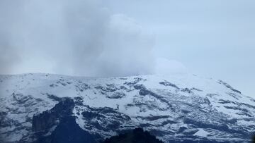 Steam and gases rise from the crater of the Nevado del Ruiz volcano, after the authorities declared an orange alert for the area and asked the population for a preventive evacuation, as seen from Murillo, Colombia, April 18, 2023. REUTERS/Luisa Gonzalez