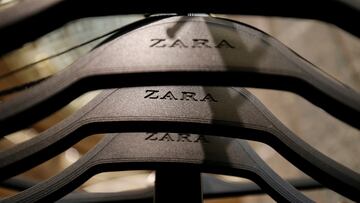 FILE PHOTO: Zara logos are seen on clothes hangers in a Zara store, an Inditex brand, in central Barcelona, Spain, December 13, 2016. REUTERS/Albert Gea/File Photo