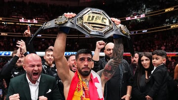 ANAHEIM, CALIFORNIA - FEBRUARY 17: Ilia Topuria of Germany celebrates after his knockout victory against Alexander Volkanovski of Australia in the UFC featherweight championship fight during the UFC 298 event at Honda Center on February 17, 2024 in Anaheim, California. (Photo by Chris Unger/Zuffa LLC via Getty Images)