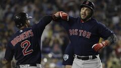Boston Red Sox&#039;s Steve Pearce celebrates his second home run with Xander Bogaerts during the eighth inning in Game 5 of the World Series baseball game against the Los Angeles Dodgers on Sunday, Oct. 28, 2018, in Los Angeles. (AP Photo/David J. Philli