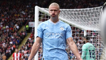 Manchester City's Norwegian striker #09 Erling Haaland celebrates scoring the opening goal during the English Premier League football match between Sheffield United and Manchester City at Bramall Lane in Sheffield, northern England on August 27, 2023. (Photo by Darren Staples / AFP) / RESTRICTED TO EDITORIAL USE. No use with unauthorized audio, video, data, fixture lists, club/league logos or 'live' services. Online in-match use limited to 120 images. An additional 40 images may be used in extra time. No video emulation. Social media in-match use limited to 120 images. An additional 40 images may be used in extra time. No use in betting publications, games or single club/league/player publications. /