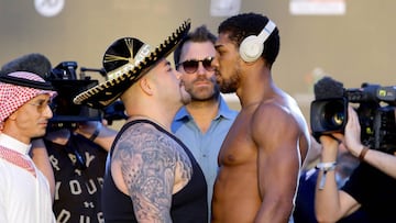 RIYADH, SAUDI ARABIA - DECEMBER 06: Andy Ruiz Jr (L) and Anthony Joshua (R) face off ahead of the IBF, WBA, WBO &amp; IBO World Heavyweight Title Fight between Andy Ruiz Jr and Anthony Joshua during the Clash on the Dunes Weigh In at the the Al Faisaliah 