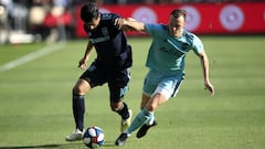 LOS ANGELES, CALIFORNIA - APRIL 21: Carlos Vela #10 of Los Angeles FC dribbles past Brad Smith #11 of Seattle Sounders during the second half of a game at Banc of California Stadium on April 21, 2019 in Los Angeles, California.   Sean M. Haffey/Getty Images/AFP
 == FOR NEWSPAPERS, INTERNET, TELCOS &amp; TELEVISION USE ONLY ==