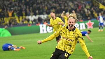 Dortmund's German midfielder #19 Julian Brandt celebrates after Dortmund scored his team's forth goal 4:2 during the UEFA Champions League quarter-final second leg football match between Borussia Dortmund and Atletico Madrid in Dortmund, western Germany on April 16, 2024. (Photo by INA FASSBENDER / AFP)