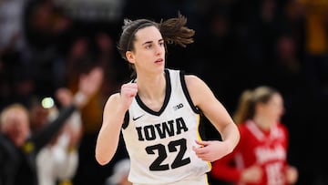 MINNEAPOLIS, MINNESOTA - MARCH 10: Caitlin Clark #22 of the Iowa Hawkeyes reacts after a three point basket in the first half against the Nebraska Cornhuskers during the Big Ten Women's Basketball Tournament Championship at Target Center on March 10, 2024 in Minneapolis, Minnesota.   Adam Bettcher/Getty Images/AFP (Photo by Adam Bettcher / GETTY IMAGES NORTH AMERICA / Getty Images via AFP)