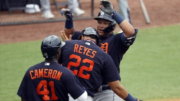 Mar 29, 2021; Tampa, Florida, USA; Detroit Tigers first baseman Miguel Cabrera (24) is congratulated by center fielder Daz Cameron (41) and center fielder Victor Reyes (22) after he hit a three-run home run during the fifth inning against the New York Yan
