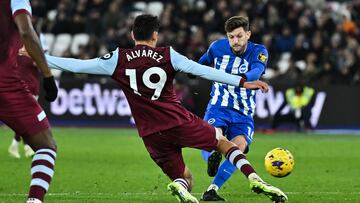 Brighton's English midfielder #14 Adam Lallana shoots the ball but misses to score (R) during the English Premier League football match between West Ham United and Brighton and Hove Albion at the London Stadium, in London, on January 2, 2024. (Photo by Ben Stansall / AFP) / RESTRICTED TO EDITORIAL USE. No use with unauthorized audio, video, data, fixture lists, club/league logos or 'live' services. Online in-match use limited to 120 images. An additional 40 images may be used in extra time. No video emulation. Social media in-match use limited to 120 images. An additional 40 images may be used in extra time. No use in betting publications, games or single club/league/player publications. /