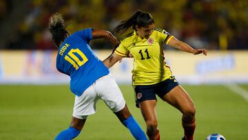 Soccer Football - Women's Copa America - Final - Colombia v Brazil - Estadio Alfonso Lopez, Bucaramanga, Colombia - July 30, 2022 Brazil's Duda in action with Colombia's Catalina Usme REUTERS/Mariana Greif