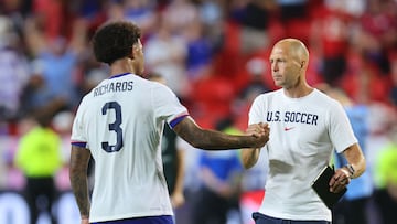 KANSAS CITY, MISSOURI - JULY 01: Chris Richards of United States and Gregg Berhalter, Head Coach of United States look dejected after the team's elimination during the CONMEBOL Copa America 2024 Group C match between United States and Uruguay at GEHA Field at Arrowhead Stadium on July 01, 2024 in Kansas City, Missouri.   Michael Reaves/Getty Images/AFP (Photo by Michael Reaves / GETTY IMAGES NORTH AMERICA / Getty Images via AFP)
