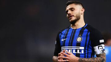 Inter Milan's Argentinian forward Mauro Icardi reacts during the Italian Serie A football match Inter Milan vs Napoli on March 11, 2018 at the San Siro stadium in Milan. / AFP PHOTO / MARCO BERTORELLO