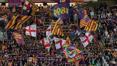 Barcelona's supporters wave flags during the UEFA Champions League 1st round day 1 Group H football match between FC Barcelona and Royal Antwerp FC at the Estadi Olimpic Lluis Companys in Barcelona on September 19, 2023. (Photo by LLUIS GENE / AFP)