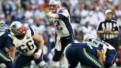 Why do NFL and college football players wear a towel when they play?