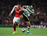Soccer Football - UEFA Champions League - Quarter Final - Second Leg - Arsenal v Sporting CP - Emirates Stadium, London, Britain - April 15, 2026 Arsenal's William Saliba in action with Sporting CP's Luis Suarez REUTERS/Hannah Mckay