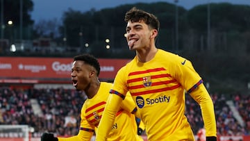 Soccer Football - LaLiga - Girona v FC Barcelona - Estadi Montilivi, Girona, Spain - January 28, 2023 FC Barcelona's Pedri celebrates scoring their first goal with Ansu Fati REUTERS/Albert Gea