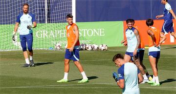 Morata, Oblak y Saúl en la sesión ayer del Atlético. 