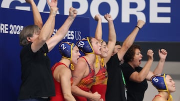 Water Polo - World Aquatics Championships - Women - Bronze Medal Match - United States v Spain - OCBC Aquatic Centre, Singapore - July 23, 2025 Spain's Ariadna Ruiz Barril and Paula Camus with teammates celebrate a goal on the bench REUTERS/Jeremy Lee