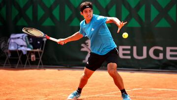 PARIS, FRANCE - MAY 27: Cristian Garin of Chile plays a forehand during his mens singles first round match against Reilly Opelka of The United States during Day two of the 2019 French Open at Roland Garros on May 27, 2019 in Paris, France. (Photo by Clive Brunskill/Getty Images)