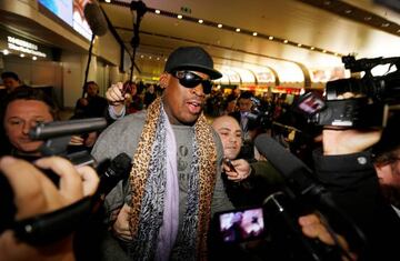 Former NBA basketball player Dennis Rodman speaks to the media after returning from his trip to North Korea at Beijing airport