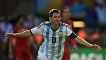 (FILES) In this file photo taken on June 21, 2014 Argentina&#039;s forward and captain Lionel Messi celebrates after scoring a goal during a Group F football match between Argentina and Iran at the Mineirao Stadium in Belo Horizonte during the 2014 FIFA World Cup in Brazil.   AFP PHOTO / PEDRO UGARTE