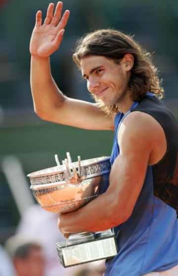 In 2006, Nadal added a second French Open by beating Roger Federer in four sets, 1-6, 6-1, 6-4, 7-6.