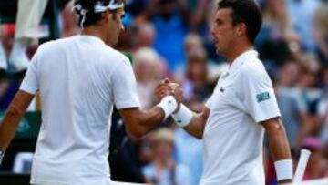 Federer y Bautista.