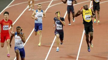 Athletics - World Athletics Championships - Men's 400 Metres Relay Final - London Stadium, London, Britain – August 12, 2017. Nethaneel Mitchell-Blake of Great Britain wins the final as Usain Bolt of Jamaica appears injured. REUTERS/John Sibley