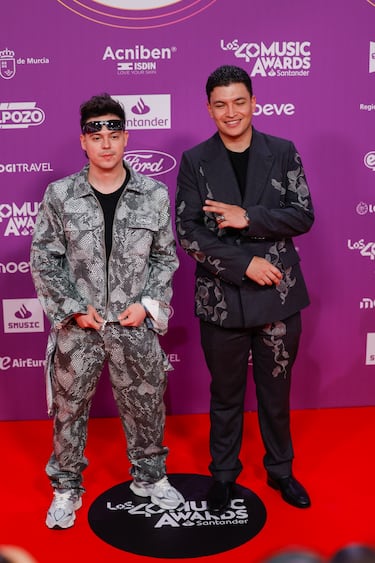 Pipe Flores y Roberto Cardona posan en la alfombra roja. 
 