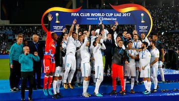 Madrid players celebrate with the trophy after winning the FIFA Club World Cup