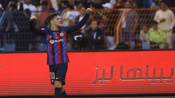 Barcelona's Spanish midfielder Gavi celebrates scoring his team's first goal during the Spanish Super Cup final football match between Real Madrid CF and FC Barcelona at the King Fahd International Stadium in Riyadh, Saudi Arabia, on January 15, 2023. (Photo by Fayez NURELDINE / AFP)