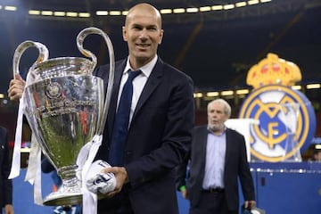 More important than money | Real Madrid's French coach Zinedine Zidane holds the trophy after Real Madrid won the 2017 Uefa Champions League.