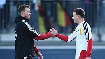 Soccer Football - FIFA World Cup - UEFA Qualifiers - Germany Training - AOK Stadion, Wolfsburg, Germany - November 10, 2025 Germany coach Julian Nagelsmann with Said El Mala during training REUTERS/Annegret Hilse