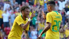 LIVERPOOL, ENGLAND - JUNE 03:  Firmino of Brazil celebrates after scoring his sides second goal with Neymar Jr of Brazil during the International Friendly match between Croatia and Brazil at Anfield on June 3, 2018 in Liverpool, England.  (Photo by Alex L