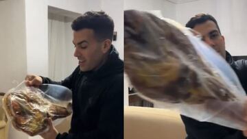 Un argentino en España recibe su primera cesta de Navidad y su reacción al ver el jamón es épica