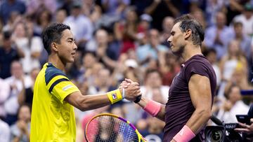 Spain's Rafael Nadal (R) greets Australia's Rinky Hijikata (L) during their 2022 US Open Tennis tournament men's singles first round match at the USTA Billie Jean King National Tennis Center in New York, on August 30, 2022. (Photo by COREY SIPKIN / AFP)