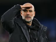 Manchester City's Spanish manager Pep Guardiola reacts on the pitch after the English Premier League football match between Crystal Palace and Manchester City at Selhurst Park in south London on December 14, 2025. City won the game 3-0. (Photo by Glyn KIRK / AFP) / RESTRICTED TO EDITORIAL USE. No use with unauthorized audio, video, data, fixture lists, club/league logos or 'live' services. Online in-match use limited to 120 images. An additional 40 images may be used in extra time. No video emulation. Social media in-match use limited to 120 images. An additional 40 images may be used in extra time. No use in betting publications, games or single club/league/player publications. /
